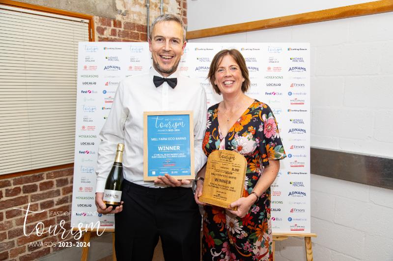 Emma and Neil Punchard getting award