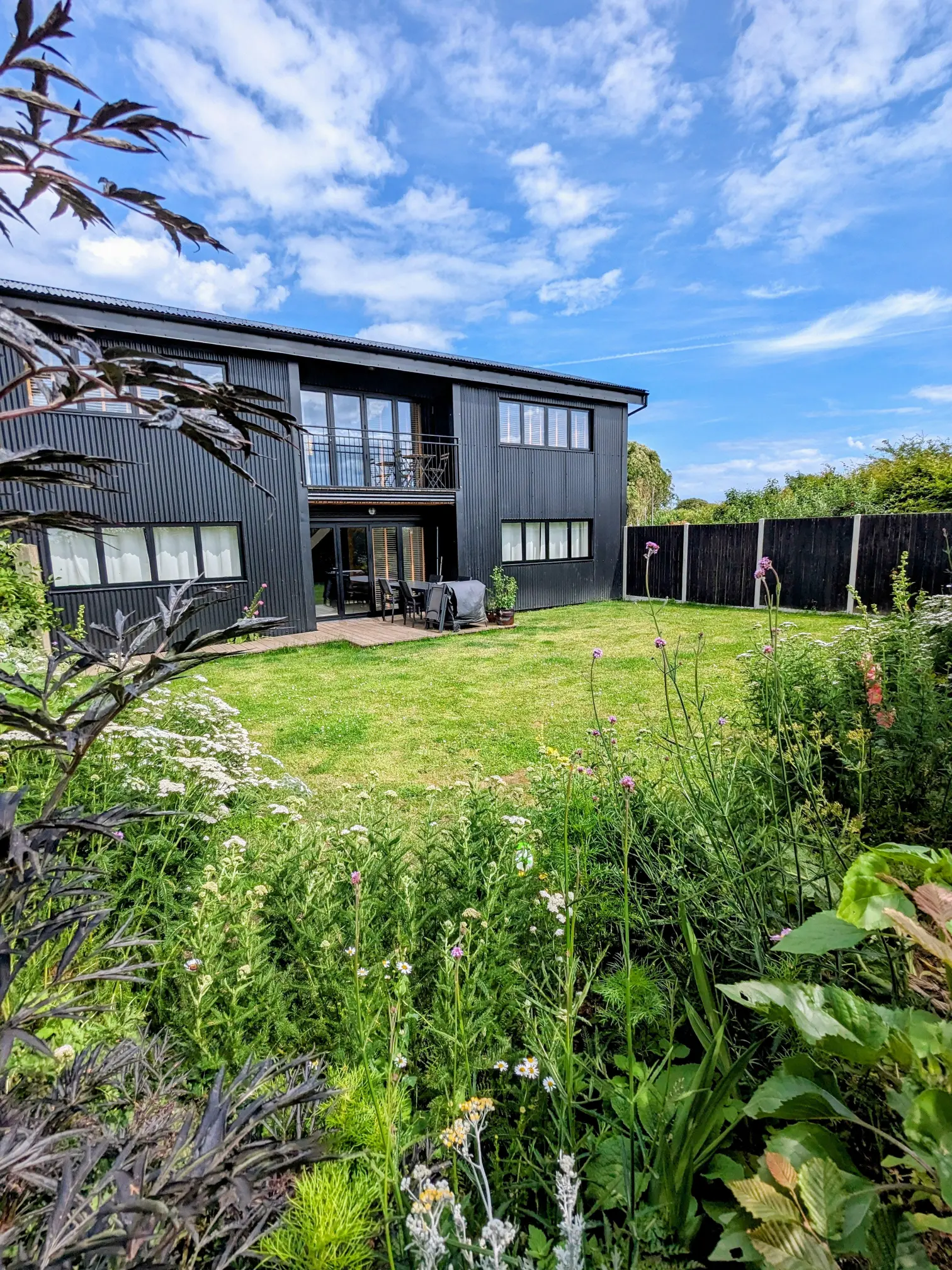 The Grain Barn. Contemporary Norfolk Holiday Cottage with Dog-Friendly Garden