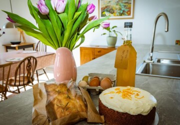 Cake and eggs with tulip flower