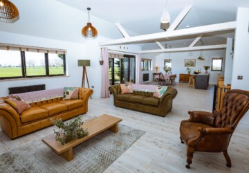 Sitting area Upstairs sitting area in the Grain Barn with leather sofas and vaulted ceiling