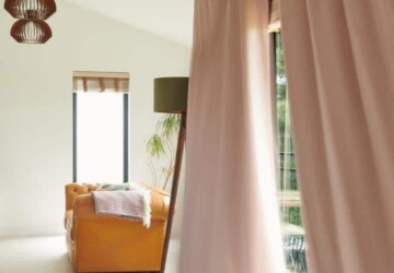 Pink curtains flowing in the wind